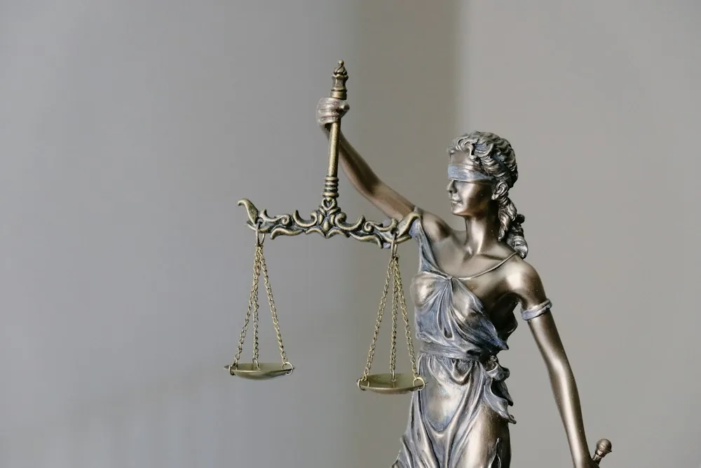 Courthouse columns and scales of justice